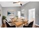 Formal dining room boasting hardwood floors, neutral walls, and a cabinet for storage at 6628 Cool Water Ct, Charlotte, NC 28215