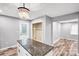 Updated kitchen featuring granite countertops, white cabinets, stainless steel appliances, and eat-in space at 6628 Cool Water Ct, Charlotte, NC 28215