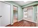 Open living room area with wood floors and natural light at 7213 Quail Meadow Ln, Charlotte, NC 28210