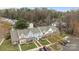 Aerial view of townhouses with lush trees and convenient parking, showcasing community living at 7707 Petrea Ln, Charlotte, NC 28227