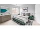 Calming bedroom with natural light, neutral tones, and stylish furnishings at 7707 Petrea Ln, Charlotte, NC 28227