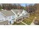 Charming townhome featuring a covered porch and well-maintained landscaping in a desirable neighborhood at 7707 Petrea Ln, Charlotte, NC 28227