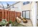 Cozy patio with chairs and a small table, ideal for relaxing outdoors at 7707 Petrea Ln, Charlotte, NC 28227