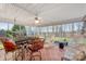 Enclosed porch with tile flooring and outdoor seating; perfect for enjoying the outdoors, bug free at 801 Toncin Ave, Bessemer City, NC 28016