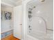 A classic shower with built in shelves and a bright white interior, featuring a tub at 801 Toncin Ave, Bessemer City, NC 28016