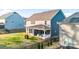 Spacious backyard with a covered patio, perfect for outdoor gatherings and relaxation at 967 Stebbins Dr, Fort Mill, SC 29715