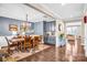 Beautiful dining room with hardwood floors that flows into an open living area, great for entertaining at 967 Stebbins Dr, Fort Mill, SC 29715