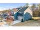 This two-story home boasts an attached garage, lush lawn, and a charming, traditional design at 967 Stebbins Dr, Fort Mill, SC 29715