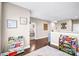 Bright hallway with hardwood floors and decorative shelving. Ideal play area at 967 Stebbins Dr, Fort Mill, SC 29715