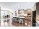 Open-concept kitchen with dark cabinets, stainless steel appliances, a large island, and seating at 967 Stebbins Dr, Fort Mill, SC 29715