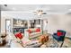 Open-concept living area with stylish furnishings, hardwood floors, and seamless flow to the kitchen at 967 Stebbins Dr, Fort Mill, SC 29715