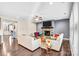 Spacious living room with a stone fireplace, modern decor, and an inviting atmosphere for relaxation at 967 Stebbins Dr, Fort Mill, SC 29715