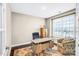 Bright home office with a desk, arm chair, hardwood floors and a window at 967 Stebbins Dr, Fort Mill, SC 29715