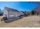 Expansive backyard view showcasing a patio area perfect for outdoor relaxation at 1017 Village Green Ln, Rock Hill, SC 29730