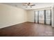 Bedroom featuring hardwood floors, ceiling fan and ample natural light at 1017 Village Green Ln, Rock Hill, SC 29730