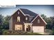 Beautiful two story home featuring brick and siding details, manicured lawn, and a two car garage at 1029 Merganser Way, Indian Trail, NC 28079