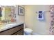 Bathroom featuring a vanity with granite countertop, wood cabinets and framed art at 1049 Merganser Way, Indian Trail, NC 28079