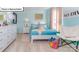 Light-filled bedroom featuring a playful color scheme, a cozy chair, and plush carpet at 1049 Merganser Way, Indian Trail, NC 28079