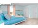 Cozy bedroom with blue accents, a plush carpet, and a view to the outdoors at 1049 Merganser Way, Indian Trail, NC 28079