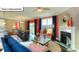 Open concept living area with dining, fireplace, and comfortable seating at 1049 Merganser Way, Indian Trail, NC 28079