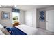 Bright bedroom featuring natural light, complementing decor, and ample closet space at 1055 Merganser Way, Indian Trail, NC 28079