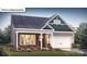 Charming home with a mix of brick and siding, a well-manicured lawn, and a welcoming two-car garage at 1055 Merganser Way, Indian Trail, NC 28079