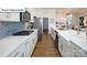 Well-equipped kitchen with an island, modern appliances, and ample counter space for cooking at 1055 Merganser Way, Indian Trail, NC 28079