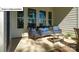 Inviting patio features comfortable seating, creating an ideal outdoor relaxation space at 1055 Merganser Way, Indian Trail, NC 28079