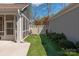 The back yard has a fountain, a screen porch, and artificial turf for low-maintenance outdoor living at 1128 Avalon Pl, Matthews, NC 28104