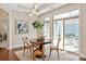 Bright dining area with large windows offers views of the outdoor patio at 1128 Avalon Pl, Matthews, NC 28104