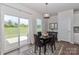 Eat in kitchen/dining area with access to an outdoor patio and backyard at 141 Slip Shot Ln, Troutman, NC 28166
