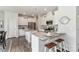 Bright kitchen with white cabinets, stainless steel appliances, and granite countertops at 141 Slip Shot Ln, Troutman, NC 28166
