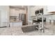 Kitchen with stainless steel sink, appliances, white cabinets, and granite counters at 141 Slip Shot Ln, Troutman, NC 28166
