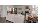 Spacious living room with comfortable seating, fireplace, hardwood floors, and an open layout perfect for entertaining at 141 Slip Shot Ln, Troutman, NC 28166