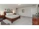 Spacious main bedroom boasts neutral paint and plush carpet at 141 Slip Shot Ln, Troutman, NC 28166