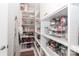 Walk-in pantry with custom shelving for organized storage at 141 Slip Shot Ln, Troutman, NC 28166