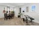 A carpeted bonus room features musical instruments, a small table, and natural light at 14235 Canemeadow Dr # 102, Charlotte, NC 28278