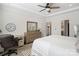 Bright main bedroom with neutral tones, carpet flooring, a comfortable desk area, and ensuite access at 14235 Canemeadow Dr # 102, Charlotte, NC 28278