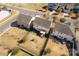 Aerial view of a backyard featuring a playset and pergola-covered patio area at 1519 Arcadia Bluff Dr, York, SC 29745