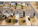 Aerial view of several homes in a neighborhood with well-manicured lawns at 1519 Arcadia Bluff Dr, York, SC 29745