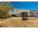 Large fenced backyard with playset, offering ample space for outdoor activities at 1519 Arcadia Bluff Dr, York, SC 29745