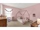 Cozy bedroom with pastel pink walls, decorative lighting, and plush accents at 1519 Arcadia Bluff Dr, York, SC 29745