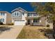 Charming two-story home with a well-manicured lawn and a welcoming front porch at 1519 Arcadia Bluff Dr, York, SC 29745
