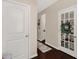Bright hallway with hardwood floors, neutral walls, and decorative accents at 1519 Arcadia Bluff Dr, York, SC 29745