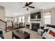 Spacious living room featuring a fireplace, dining area, and open floor plan at 1519 Arcadia Bluff Dr, York, SC 29745