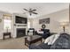Comfortable living room with a fireplace, plush sofas, and a ceiling fan at 1519 Arcadia Bluff Dr, York, SC 29745