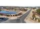 Aerial view of the community featuring a pond and winding street at 16200 Winfield Hall Dr, Charlotte, NC 28273