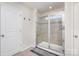 Contemporary bathroom featuring a glass-enclosed shower and sleek fixtures at 16200 Winfield Hall Dr, Charlotte, NC 28273