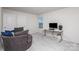 Bright bedroom featuring a desk and swivel chair with neutral walls and carpet at 16200 Winfield Hall Dr, Charlotte, NC 28273