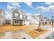 Charming two-story home with a mix of siding and brick, complemented by a well-maintained lawn and landscaping at 16200 Winfield Hall Dr, Charlotte, NC 28273